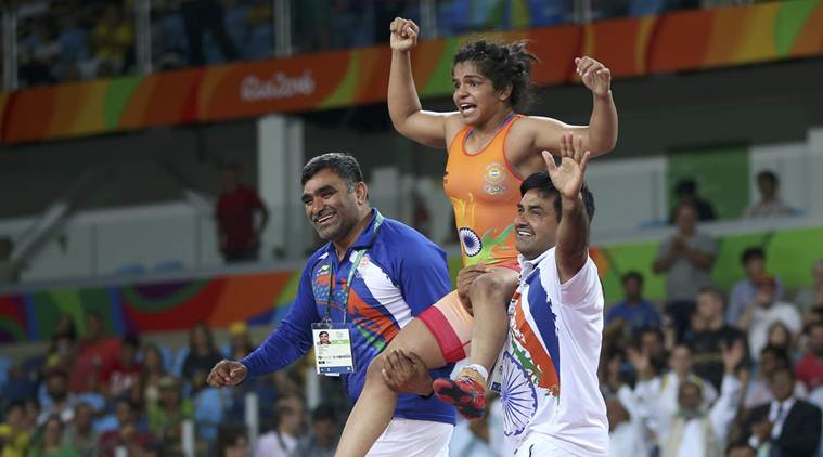 2016 Rio Olympics - Wrestling - Final - Women's Freestyle 58 kg Bronze - Carioca Arena 2 - Rio de Janeiro, Brazil - 17/08/2016. Sakshi Malik (IND) of India celebrates with her team members after winning the bronze medal. REUTERS/Toru Hanai FOR EDITORIAL USE ONLY. NOT FOR SALE FOR MARKETING OR ADVERTISING CAMPAIGNS.